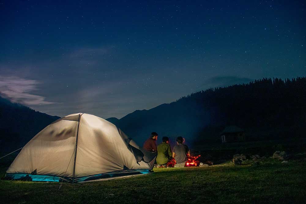 people camping in night